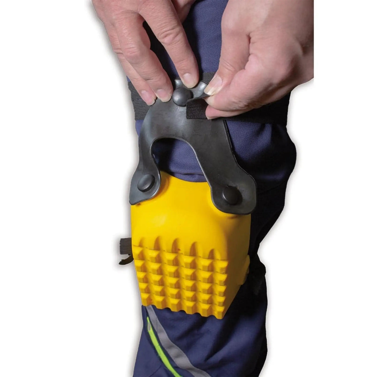 Person putting on yellow knee pads with fastening strap