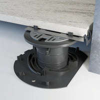 Lifestyle image of a stainless steel clip for pedestal wall connection