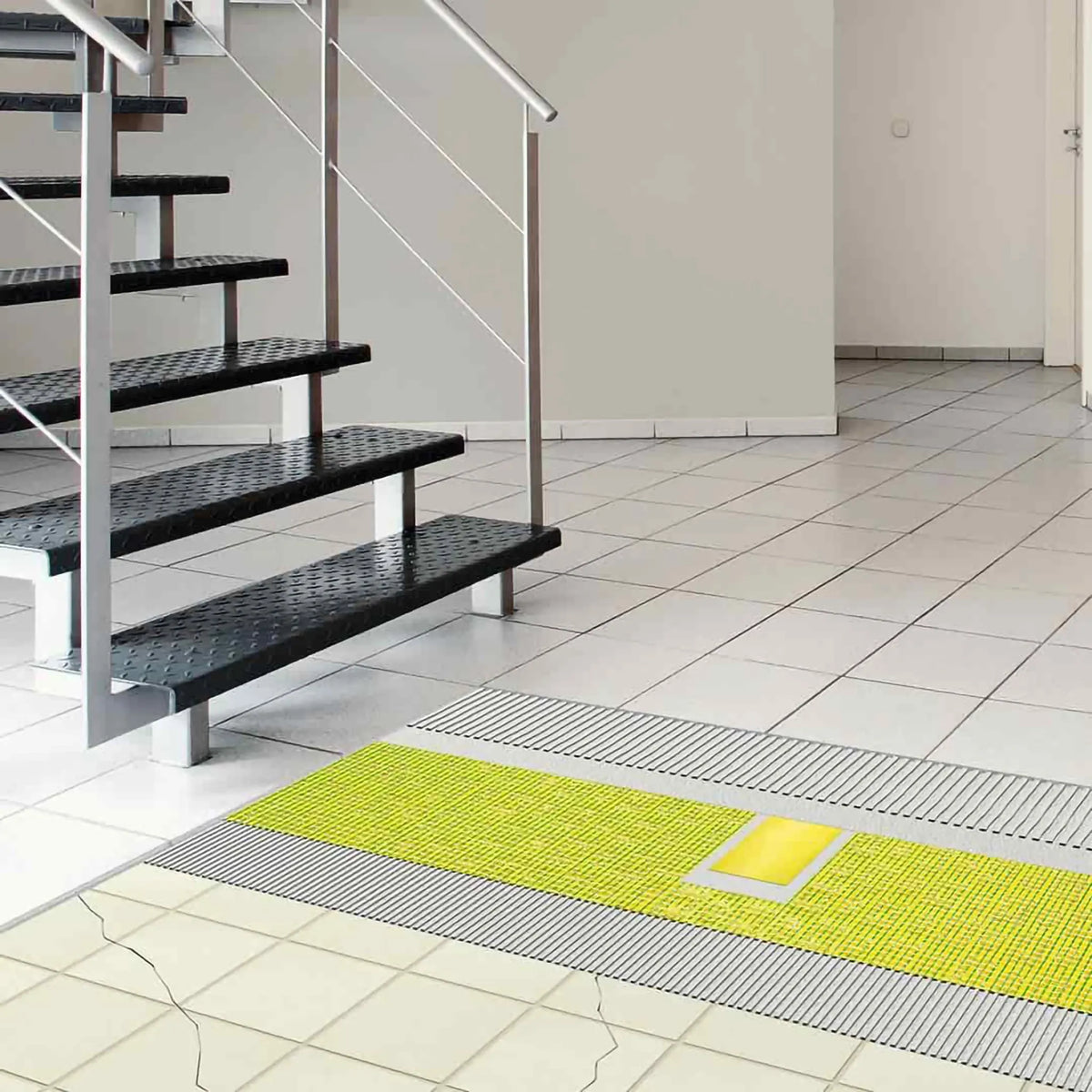 Lifestyle image of the DURAL decoupling mat CI++ in front of a staircase in the living area